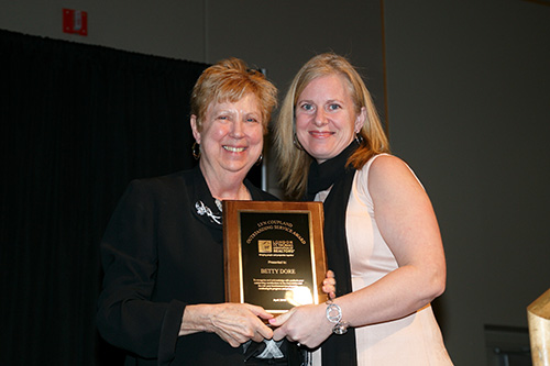 Betty Dore receiving Lyn Coupland Award