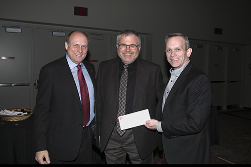 Cheque Presentation to Mission Services at 2015 AGM