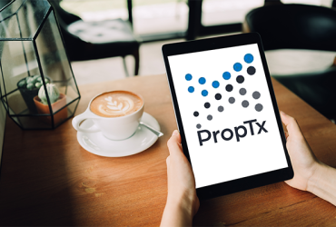 PropTx logo on tablet screen